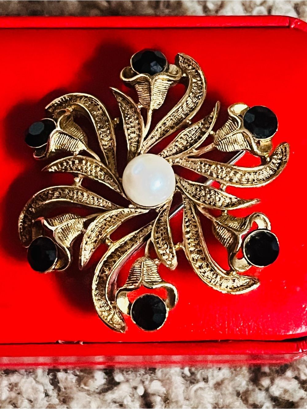 Gold-Tone Floral Brooch with Black Stones and Center Pearl
